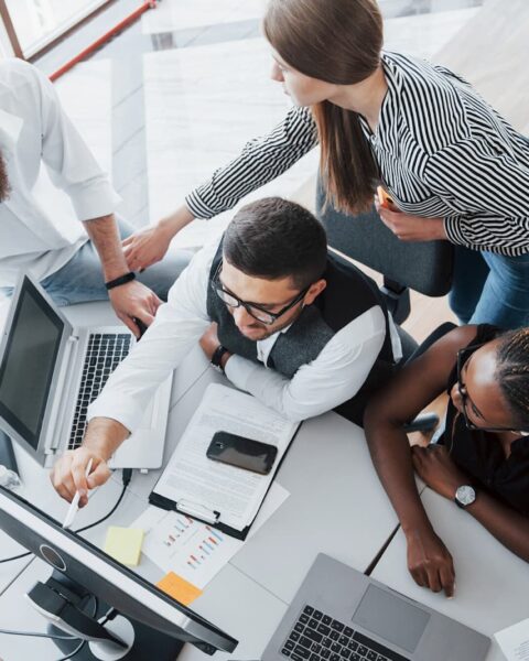 A group of multinational busy people working in the office